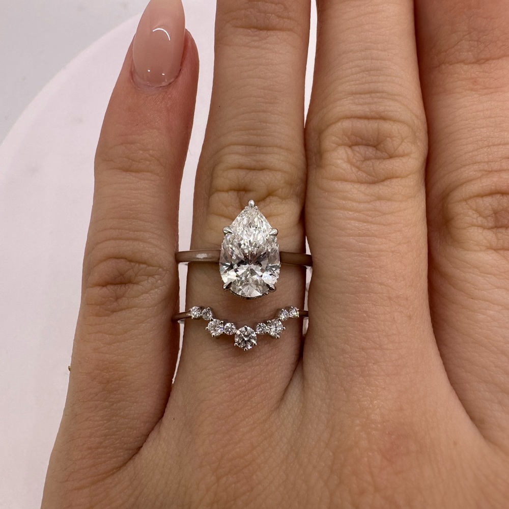 2.01 carat d vs1 pear solitaire engagement ring with hidden halo wedding band